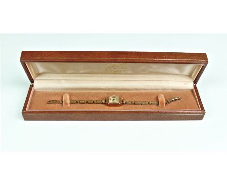 A mid-century Roamer 9ct gold ladies wrist watch, 1950s, manual wind, the rectangular silvered and rose gold dial signed 'Roa
