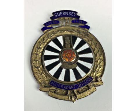 A silver gilt and enamel " Guernsey Round Table " fob medal /medallion, Toye &amp; Co, London, 1951, the medal centered by a 