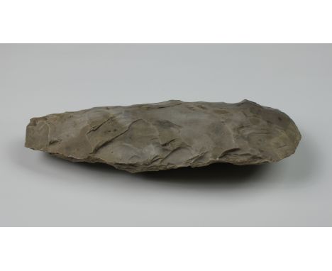 NATURAL HISTORY - Neolithic period stone axe head, 6¼in. (15.9cm.) long. (missing tip)