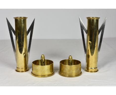 Trench Art - A pair of slender brass shell case vases with applied angular steel handles, indistinct markings to bottom, 8¼in