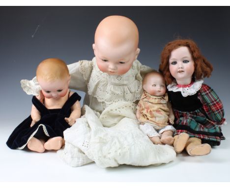 Four Armand Marseille bisque head dolls, the first - impressed 300n, DRGM 2467, with weighted blue eyes, painted lashes and r