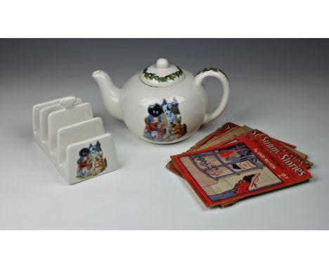 A Robert Opie Collection Golden Shred golly &amp; friends teapot, together with a matching toast rack; and five copies of 'Su