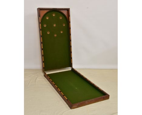 A Victorian folding table top bagatelle game, the mahogany case opening to reveal green baize covered board, bordered with in