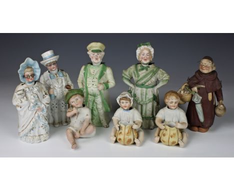 A collection of Continental nodding head porcelain figures, comprising of a porcelain pair of an older Gentleman and lady wit