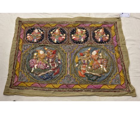 A Burmese hand embroidered beaded Kalaga wall hanging tapestry, depicting dancers, 31 x 41in. (78.8 x 104.2cm).