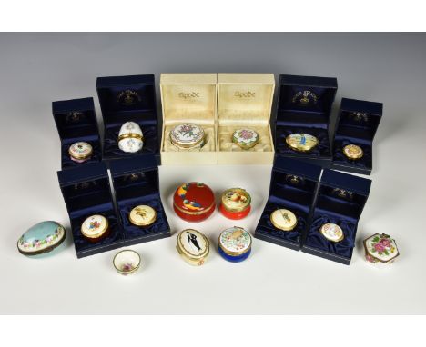 A collection of sixteen enamel and porcelain pill boxes, comprising a Royale Stratford Old Golfers pill box, limited edition 