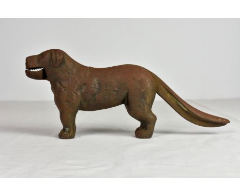 An early 20th century cast metal novelty dog nutcracker, stamped with patent No. 273480 (for Fred Alexander Rimington, 1926),