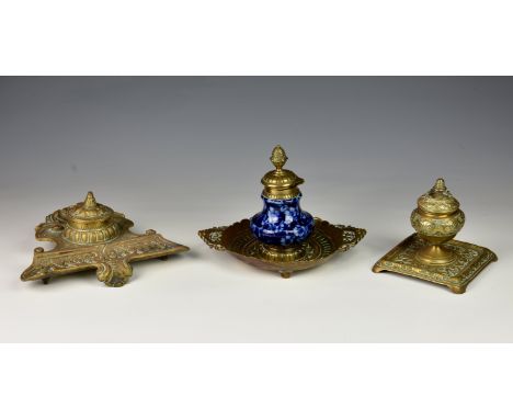 A ceramic and brass Islamic Moorish style inkwell, the elegant lift out ceramic urn form bottle decorated with floral design 