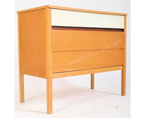 G Plan - Young Ideas Range - A retro 20th century light oak chest of drawers of simple rectangular form having a white painte