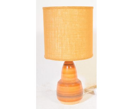 Dennis Fowler for Newport Pottery Barnstaple - A 20th century pottery lamp of vivid colourways and bulbous form complete with