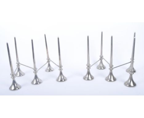 A pair of retro vintage 20th century chrome articulated candle holders in the manner of Stoff Nagel. Each candle holder havin