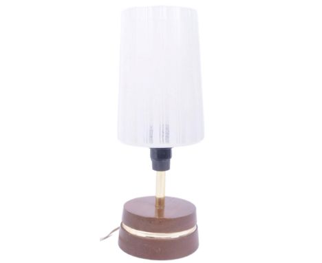 A retro mid century table / bedside table lamp light having a frosted and stripped glass cylindrical shade supported by a bra