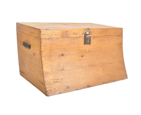 A Victorian 19th century slope fronted pine wood ship style trunk chest trunk. The chest having a straight rectangular top ov
