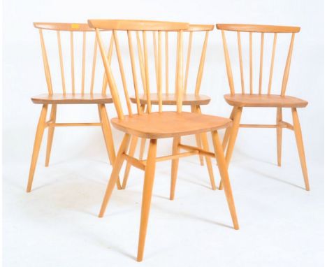 Ercol - Model 449 - A set of four vintage 20th century beech and elm stick back dining chairs by Ercol known as the Fan Back 