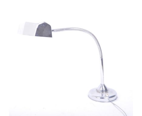 A retro vintage 20th century industrial style chrome gooseneck table desk lamp. The light having an elongated rectangular met