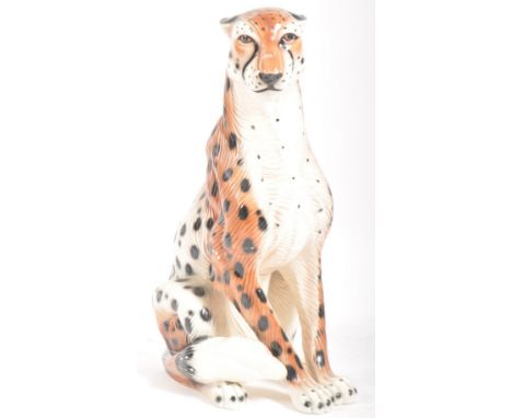 A large retro mid 20th century Italian majolica floor standing ceramic hand painted lifelike leopard sculpture. The leopard s