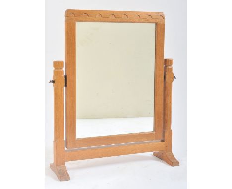 Robert ' Mouseman ' Thompson of Kilburn - A solid English oak hand carved dressing table top mirror. The mirror having a carv