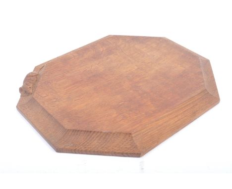 Robert ' Mouseman ' Thompson of Kilburn - A solid English oak hand carved octagonal cutting board. The board having raised ch