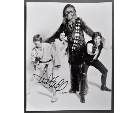 Star Wars - Mark Hamill (Luke Skywalker) - autographed 8x10" black and white photograph of the main cast, signed neatly by Ha