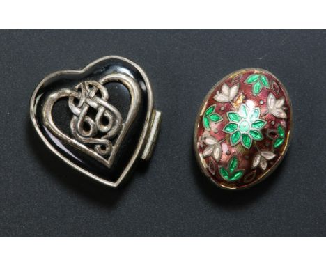 Silver and black enamel heart shaped pill box with Celtic decoration with hinged lid and a silver and floral enamel pill pot.