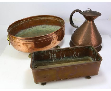 Large oval lion mask copper planter, another lion mark copper planter and a copper drink flagon.