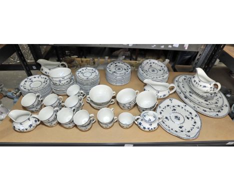 An extensive Royal Doulton 'Yorktown' dinner service, of twelve place settings, to include saucer boats, five tureens, tea an