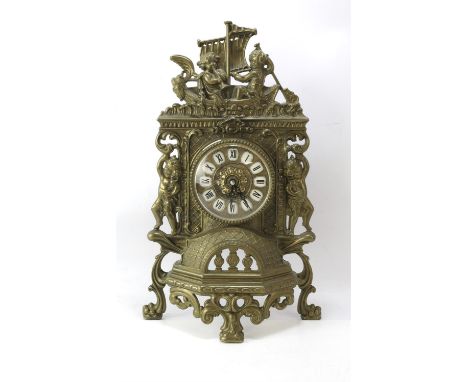 19th century brass clock mount with modern battery powered movement, with scrolling and putti decoration, 40cm high
