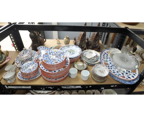 A Mintons Bow part dinner service consisting of Dinner plates, kidney shaped dishes, side plates, tureen etc.