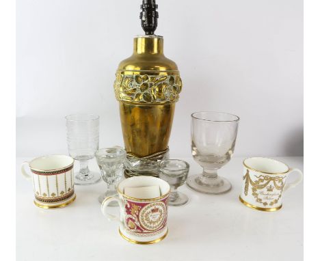 A brass table lamp with foliate decoration in rib to top.