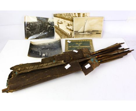Two vintage ash and yew wood long bows one marked Hamm London, 45 the other F. H. Ayers, 45. and a quantity of arrows
