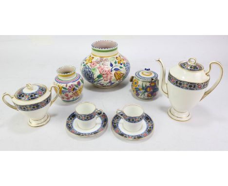 Various items of Poole pottery, to comprise a squat vase, 14.5cm high, a pair of preserve jars and covers and a smaller vase,