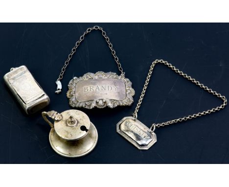 Georgian silver pocket snuff box Birmingham 1812, a silver mustard pot, a silver brandy label and a white metal whiskey label