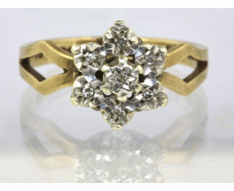 Floral damond cluster ring, illusion set diamonds in a floral motif, set in 9ctCondition Report:  2.83 grams 