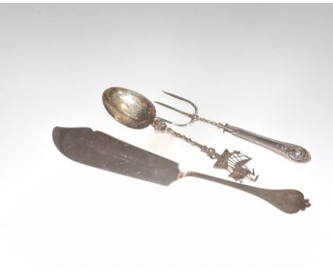 A silver fish server, London 1917 together with Victorian silver handled three prong fork, London 1866 together with a silver