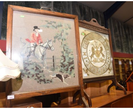 An oak framed needlework firescreen; tog. with another firescreen
