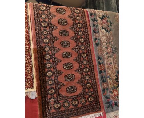 A Bokhara runner. 79x231cm