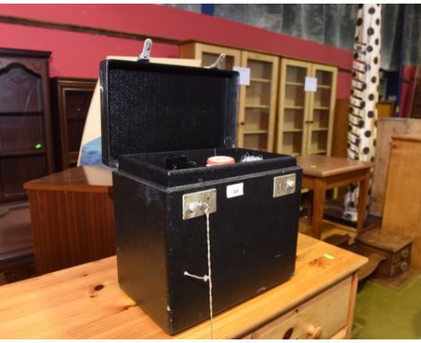 A vintage cased Singer sewing machine