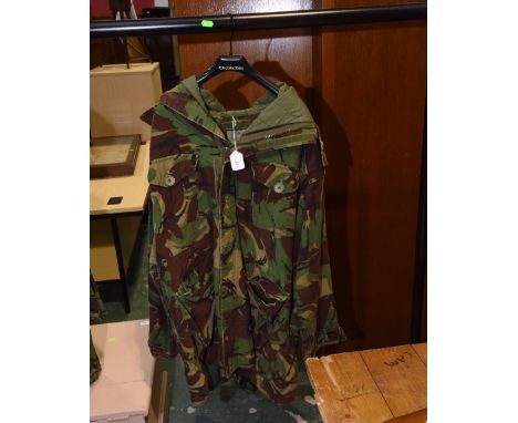 A vintage military camouflage cold weather parka