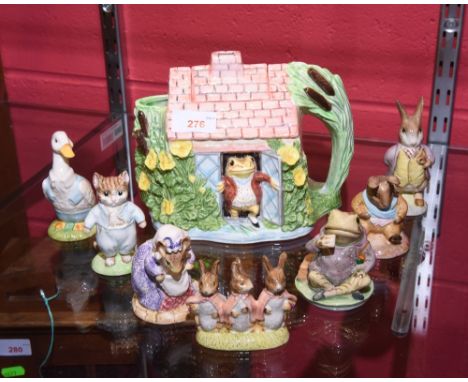 A Royal Albert china figure of Jeremy Fisher and six other Royal Albert figures together with a Border Fine Art Beatrix Potte