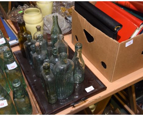 A tray of vintage glass bottles inc. apothecary, ginger beer, Newcastle Breweries and Bell Tonic, Bell & Sons Ltd veterinary 