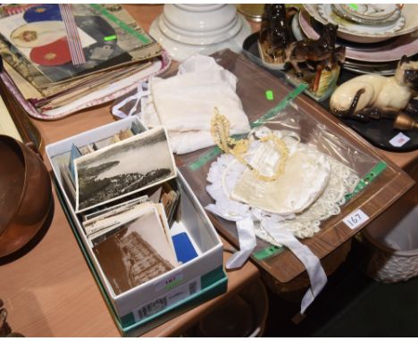 A box of vintage postcards; tog. with two bone articles and a christening set