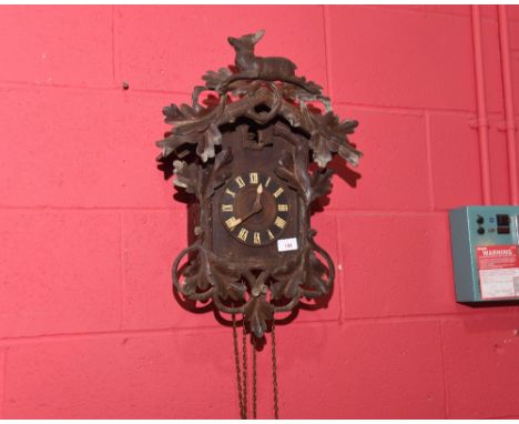 A vintage cuckoo clock in the Blackforest taste