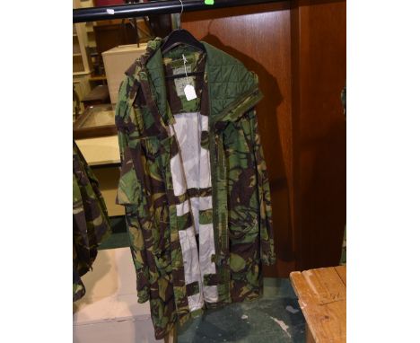 A vintage military cold weather camouflage parka