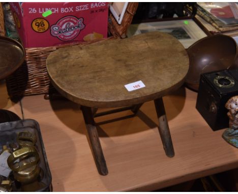 A vintage milking stool