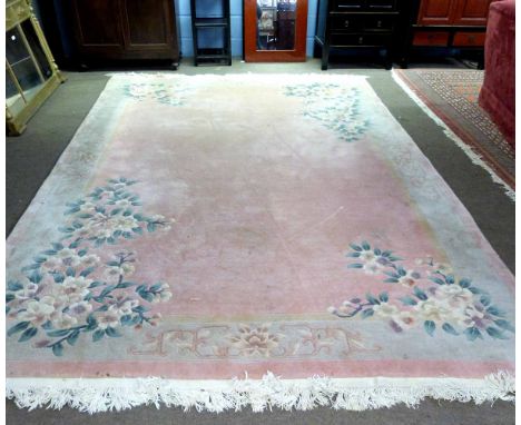 Chinese wool wash thick pile carpet with pink ground with floral decoration, 245cms wide x 350cms long 