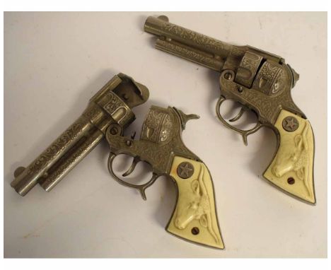 Pair of vintage metal children's toy revolvers, Texan Jr 