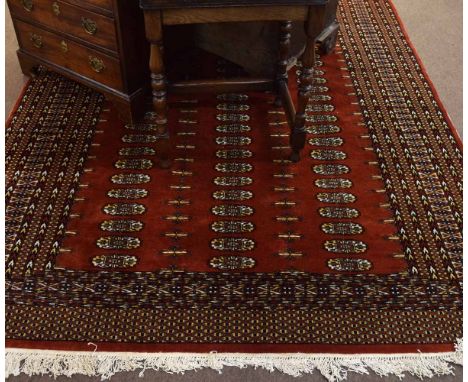 Good quality modern Bokhara carpet with rust ground with multi-gulled border, 190cms wide x 290cms long  