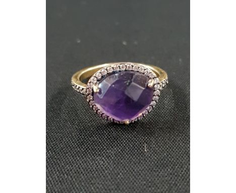 9CT GOLD AND AMETHYST RING