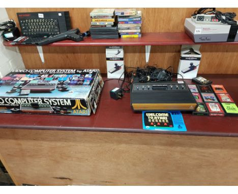 BOXED ATARI CX-2600 CONSOLE AND GAMES