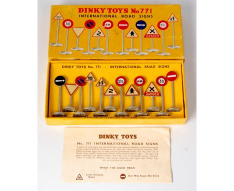 Dinky Toys, 771 International road signs comprising of 12 assorted signs, in the original lift-off lid box, with Dinky Toys l